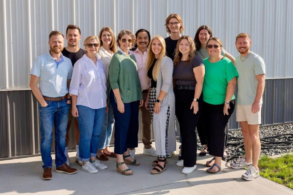 The Greater Iowa City, Inc. team gathered for a group photo, highlighting the staff dedicated to advancing economic development, supporting local businesses, and fostering community connections across the Iowa City area.